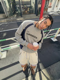 DAXUEN light cream double-layered athletic shorts — model photo