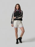DAXUEN light cream double-layered athletic shorts — model photo