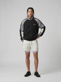 DAXUEN light cream double-layered athletic shorts — model photo