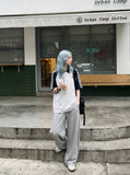 DAXUEN light pink wide-leg leisure pants — model photo
