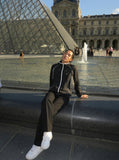 DAXUEN Lightweight hooded jacket in light grey and black — model photo