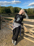 DAXUEN Men's distressed long-sleeve t-shirt with layered design — model photo