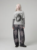 DAXUEN Men's distressed long-sleeve t-shirt with layered design — model photo