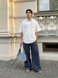 DAXUEN Oversized short-sleeved shirt with dog line art — model photo