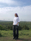 DAXUEN Oversized short-sleeved t-shirt with script graphics — model photo