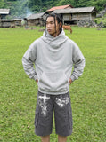 DAXUEN Loose-fitting cargo shorts with distressed graphics — model photo