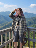 DAXUEN Loose-fitting cargo shorts with distressed graphics — model photo