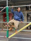 DAXUEN Men's loose fit Bermuda shorts in black and khaki — model photo