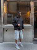 DAXUEN Men's loose-fit denim cargo shorts — model photo