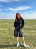DAXUEN Men's loose-fit denim cargo shorts — model photo