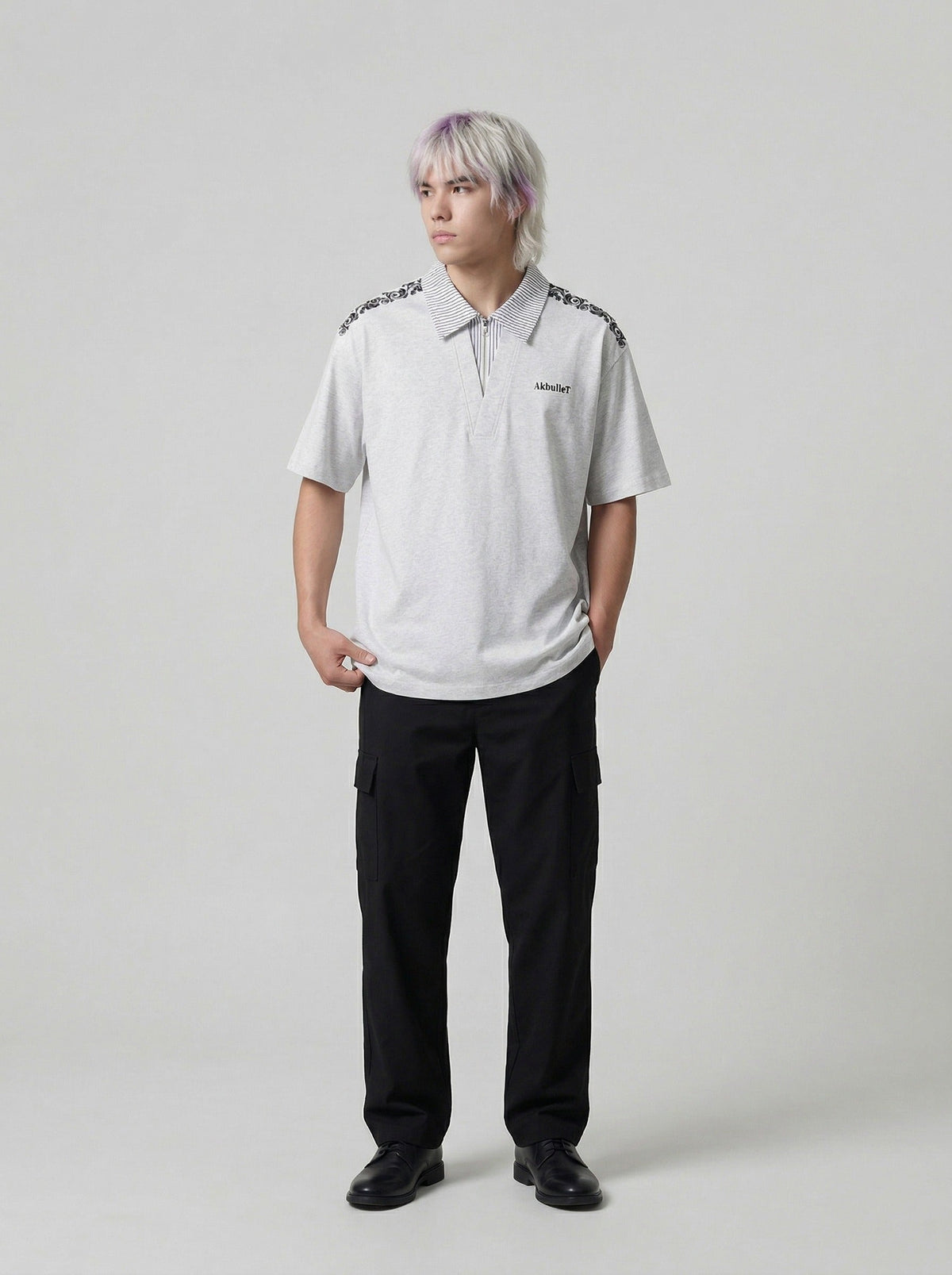 DAXUEN Loose-fitting short-sleeved polo shirt with embroidery — model photo