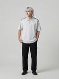 DAXUEN Loose-fitting short-sleeved polo shirt with embroidery — model photo