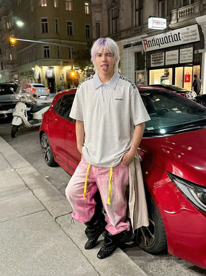 DAXUEN Loose-fitting short-sleeved polo shirt with embroidery — model photo