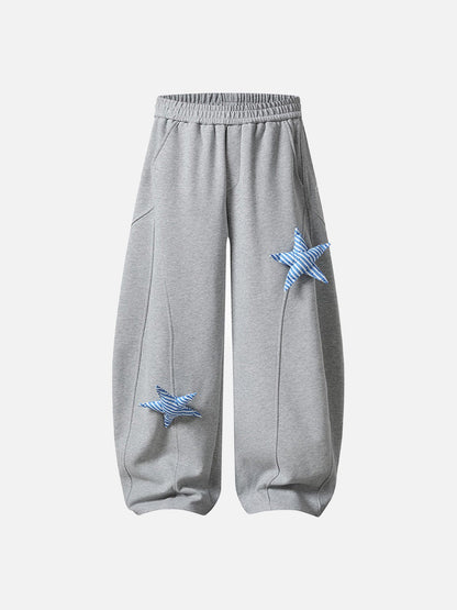 Loose-fitting wide leg sweatpants with star appliqué
