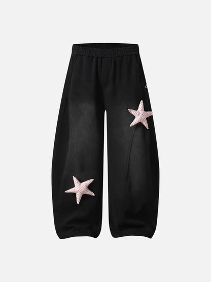 Loose-fitting wide leg sweatpants with star appliqué