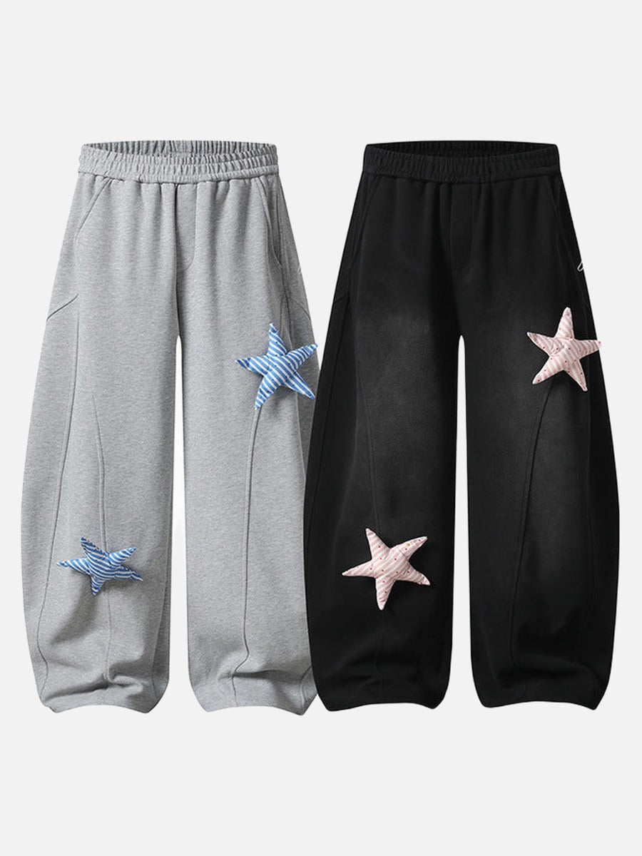 Loose-fitting wide leg sweatpants with star appliqué