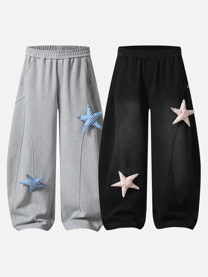 Loose-fitting wide leg sweatpants with star appliqué