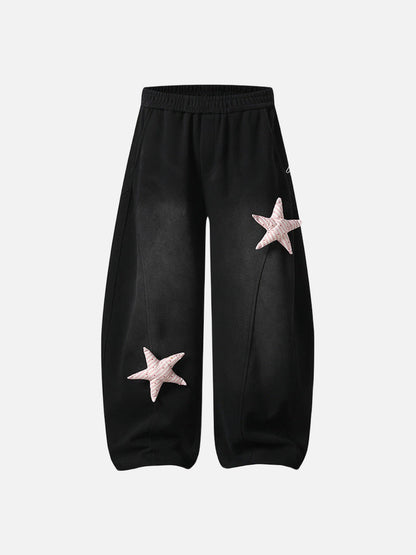 Loose-fitting wide leg sweatpants with star appliqué