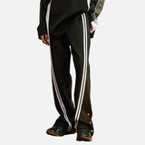 DAXUEN Loose-fitting track pants with snap buttons and stripes