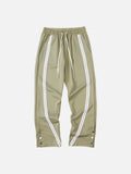 DAXUEN Loose-fitting track pants with snap buttons and stripes