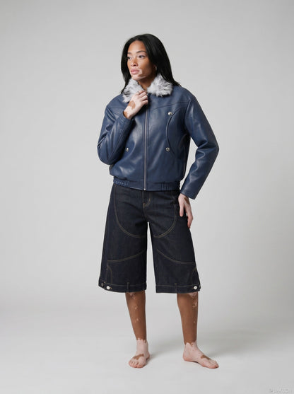 DAXUEN Wide-leg denim shorts with embroidery and contrasting stitching — model photo