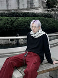 DAXUEN Wide-leg trousers with pockets and keychain accessory — model photo