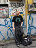 DAXUEN white oversized human head silhouette graphic tee — model photo