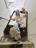 DAXUEN white oversized human head silhouette graphic tee — model photo