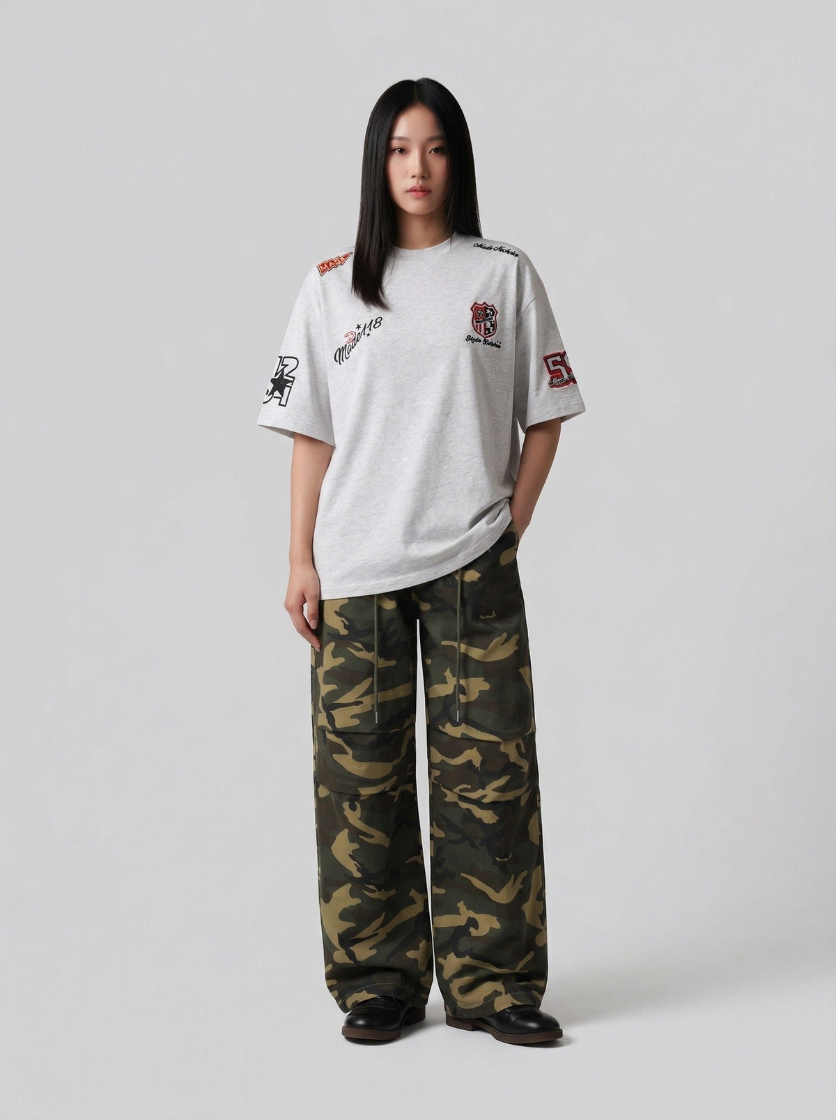 DAXUEN Oversized embroidered t-shirt with graphics — model photo