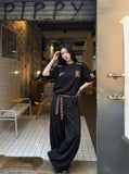 DAXUEN Oversized embroidered t-shirt with graphics — model photo