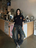 DAXUEN Oversized embroidered t-shirt with graphics — model photo