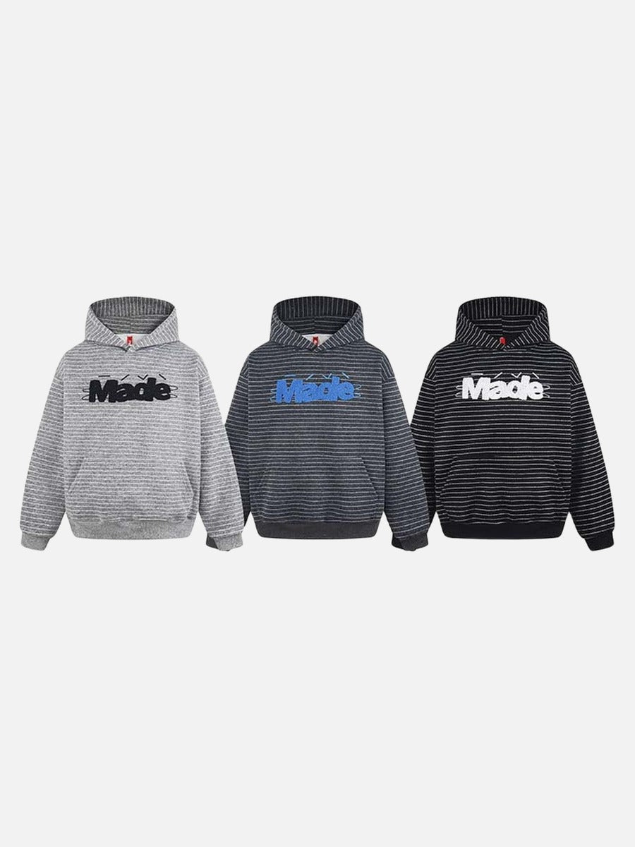 DAXUEN Oversized striped hoodie with 'Made' text