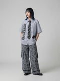 DAXUEN Striped oversized short-sleeve button-down shirt — model photo