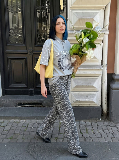 DAXUEN Grey marl short-sleeved polo shirt with star print — model photo