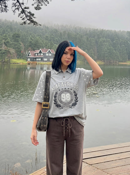 DAXUEN Grey marl short-sleeved polo shirt with star print — model photo