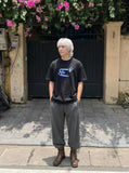 DAXUEN Oversized Abstract Symbol Graphic Tee — model photo