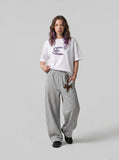 DAXUEN Oversized Abstract Symbol Graphic Tee — model photo
