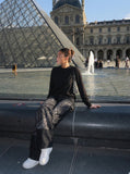 DAXUEN Wide-leg baggy denim pants with marbled pattern — model photo