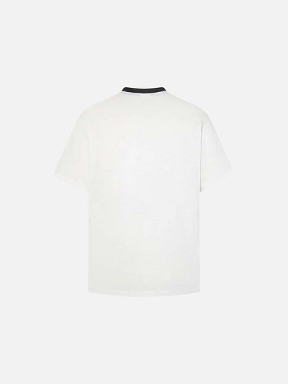 DAXUEN Graphic T-shirt with multi-panel design and relaxed fit