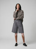 DAXUEN Medium grey wide-leg shorts with pleats and waistband — model photo