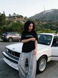 DAXUEN Oversized Slogan Print Tee — model photo