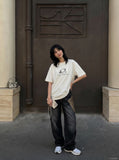 DAXUEN Oversized Metallic Oval Graphic Tee — model photo