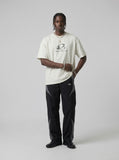 DAXUEN Oversized Metallic Oval Graphic Tee — model photo