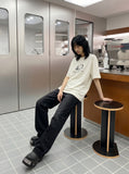 DAXUEN Oversized Metallic Oval Graphic Tee — model photo