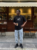 DAXUEN Oversized Metallic Oval Graphic Tee — model photo