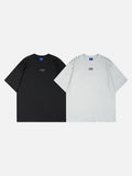 DAXUEN Short-sleeved T-shirt with metallic emblem and pleated details