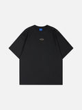 DAXUEN Short-sleeved T-shirt with metallic emblem and pleated details