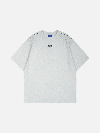 DAXUEN Short-sleeved T-shirt with metallic emblem and pleated details