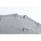 DAXUEN black oversized crewneck sweatshirt with metallic zip pocket