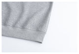 DAXUEN black oversized crewneck sweatshirt with metallic zip pocket